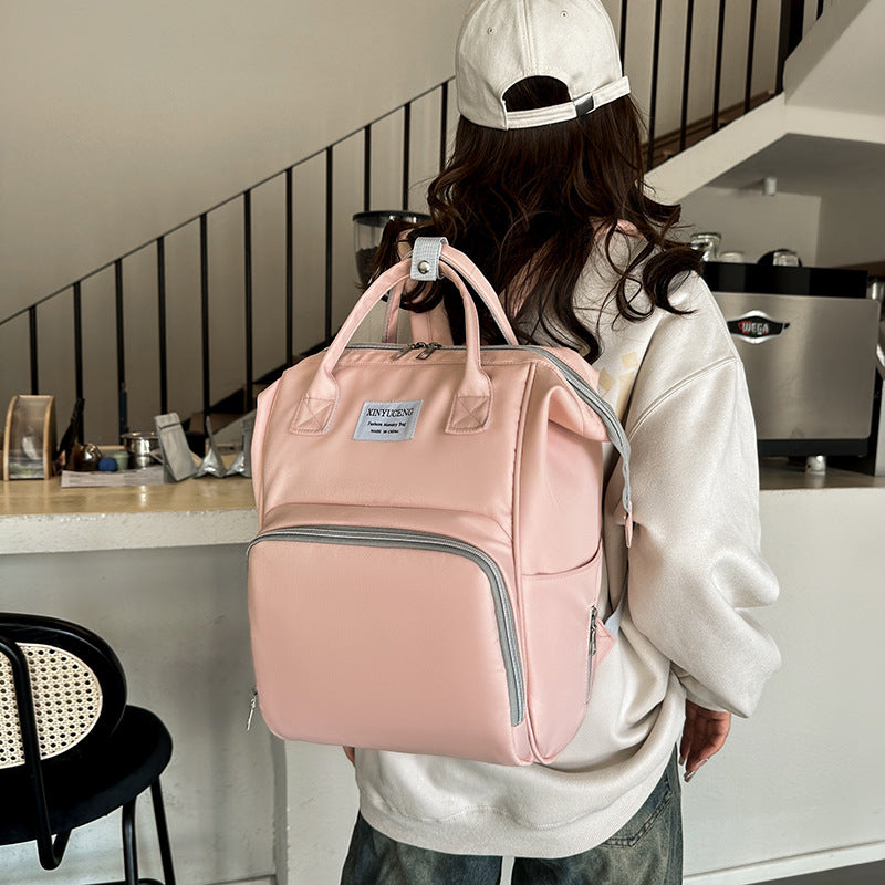 Versatile Backpack with Multi-Compartment Design Bowlift