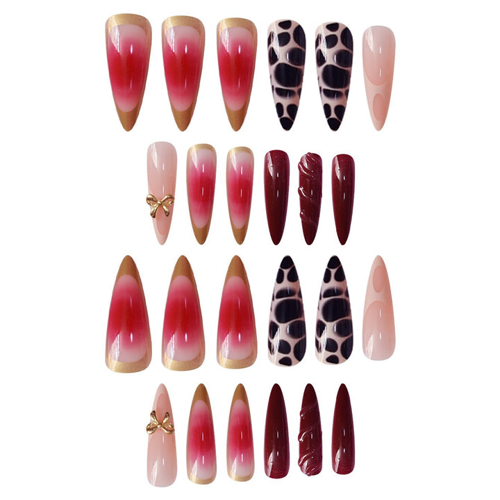 Artistic Stiletto Press-On Nail Set with Unique Accents Bowlift
