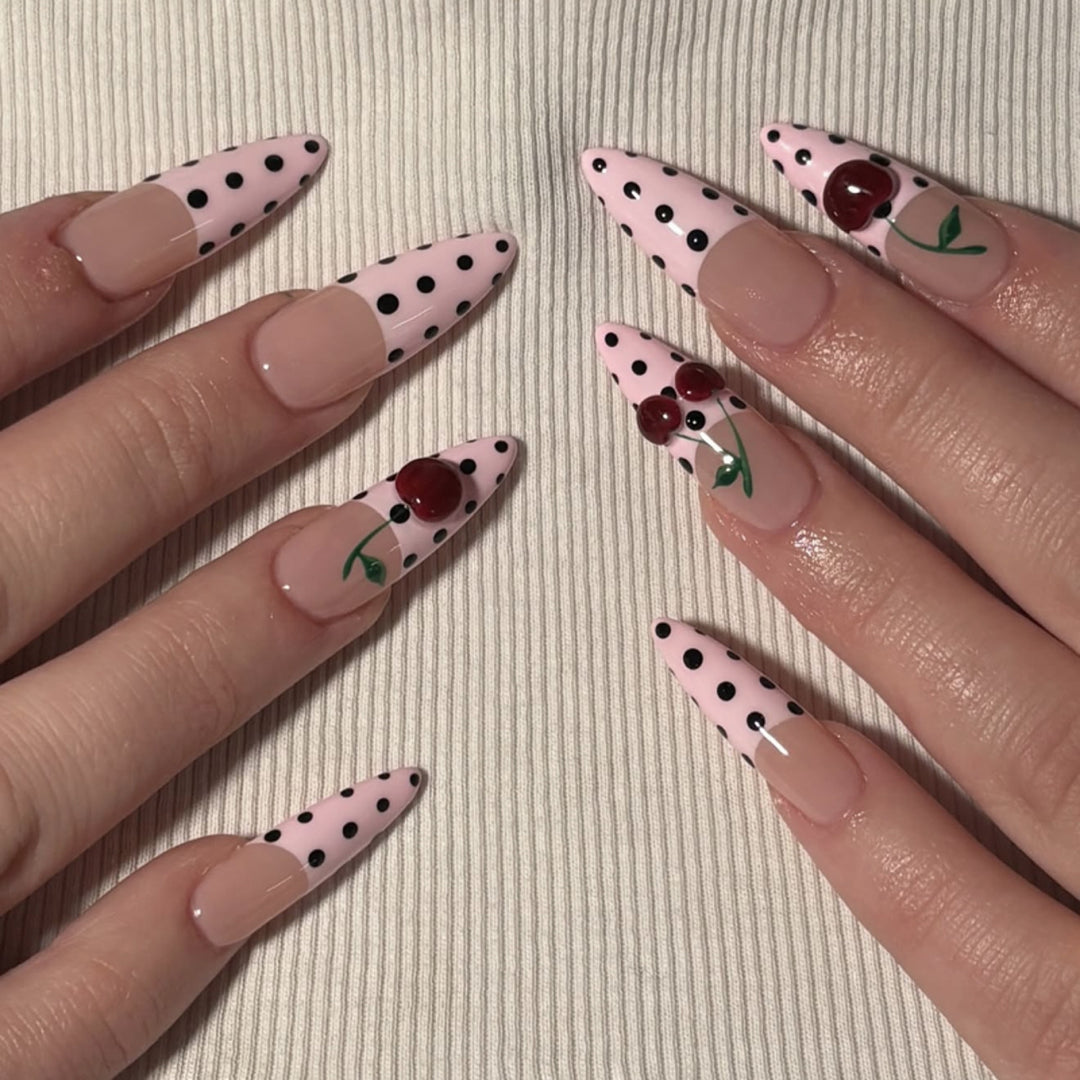 Artful stiletto nails with elegant floral design and glitter details Bowlift
