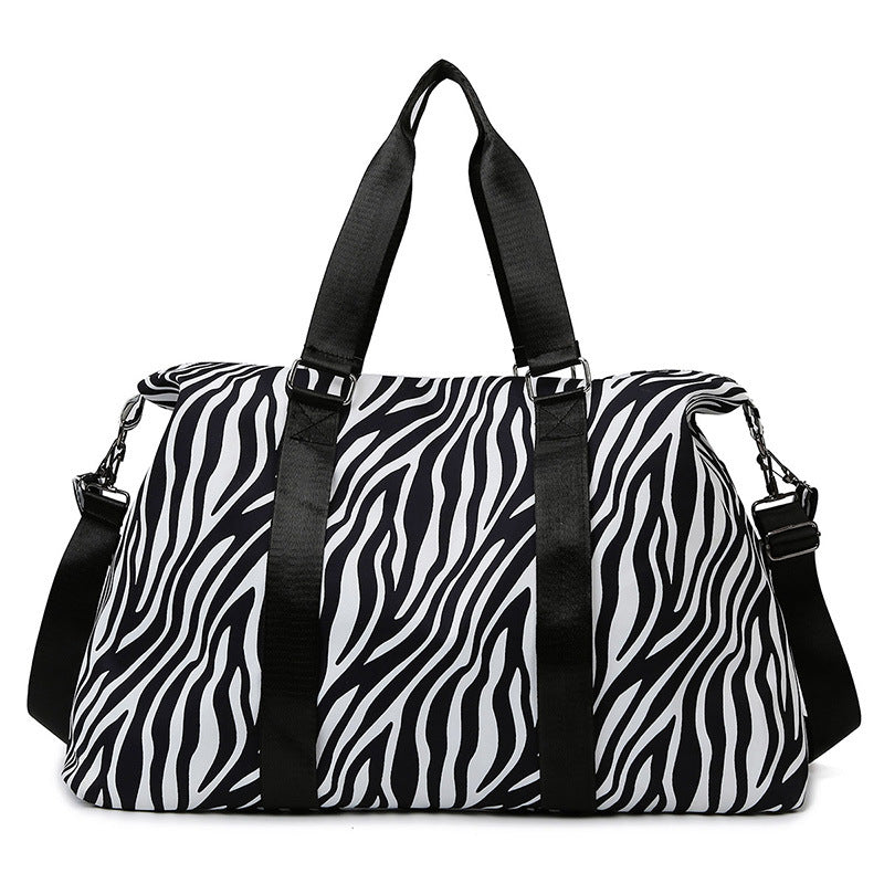 Sporty travel bag with trendy zebra pattern Bowlift