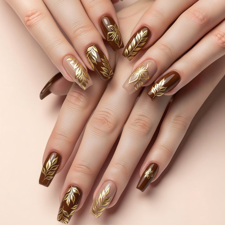 Artificial nails with floral gold design Bowlift