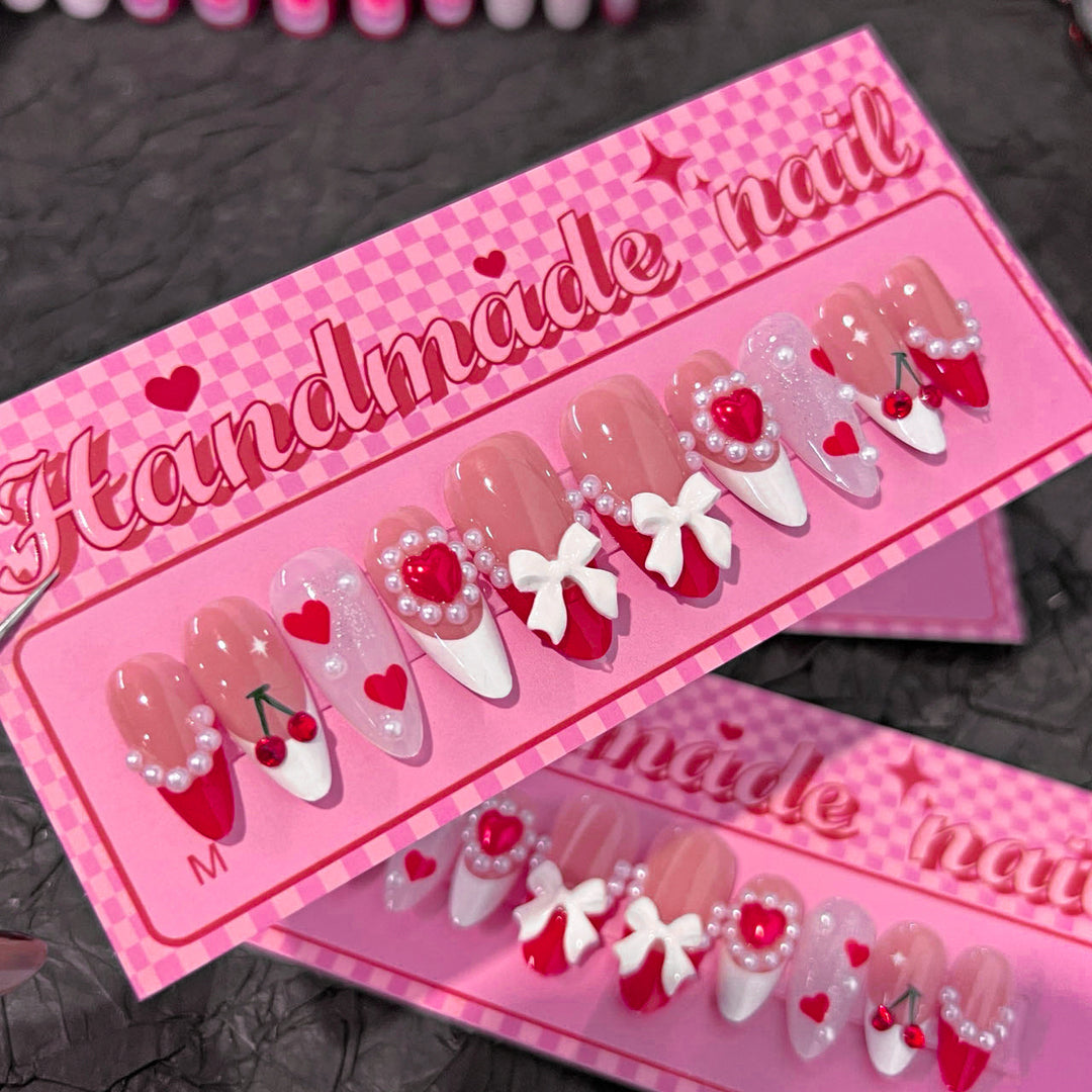 Artful Handmade Nail Art with Hearts and Ribbons Bowlift