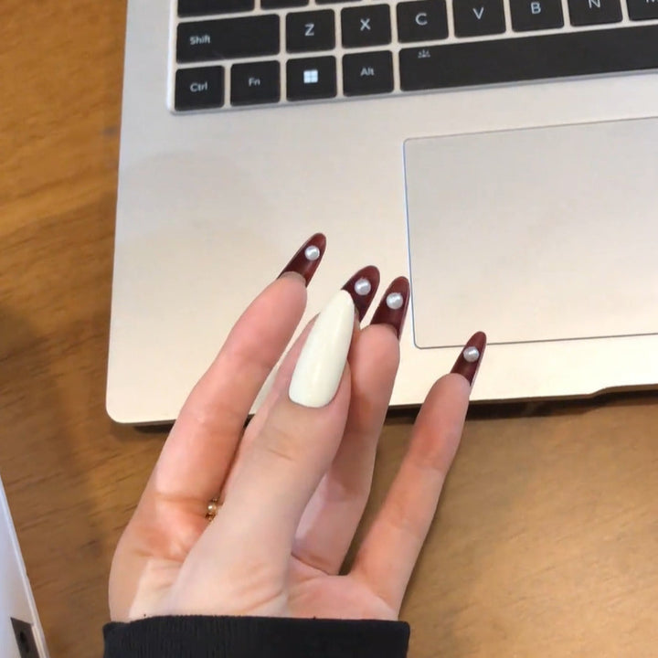 Glamorous artificial nails with elegant accents Bowlift
