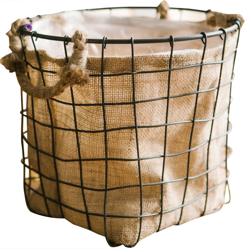 Decorative storage basket made of wire and linen Bowlift