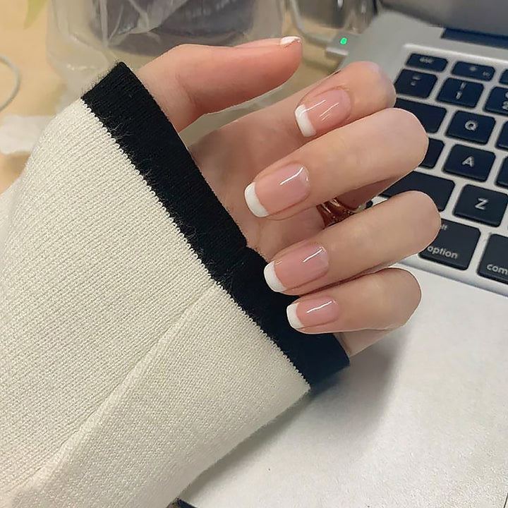 Artificial nail set with elegant French tips and natural shine Bowlift