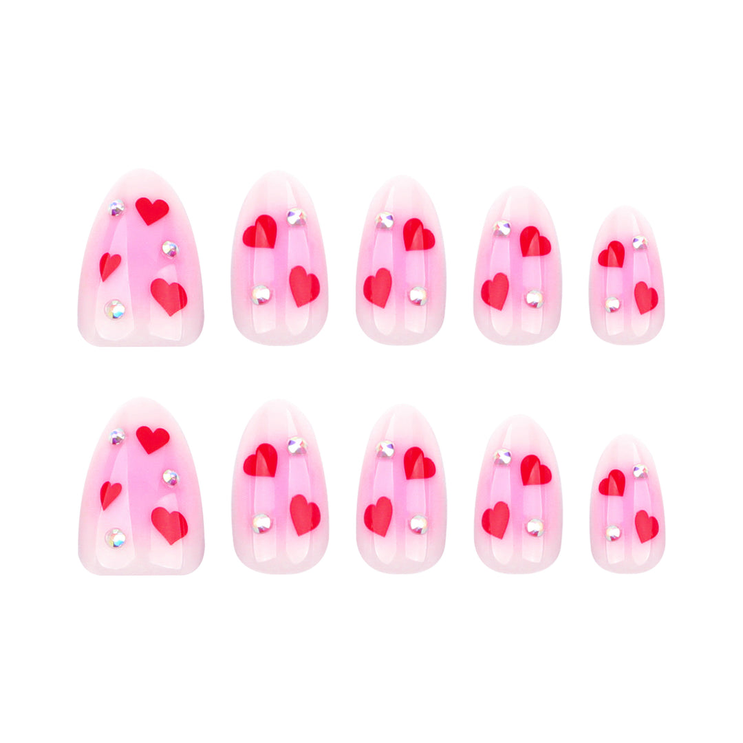 Artful nail art with heart motifs and glamorous details Bowlift