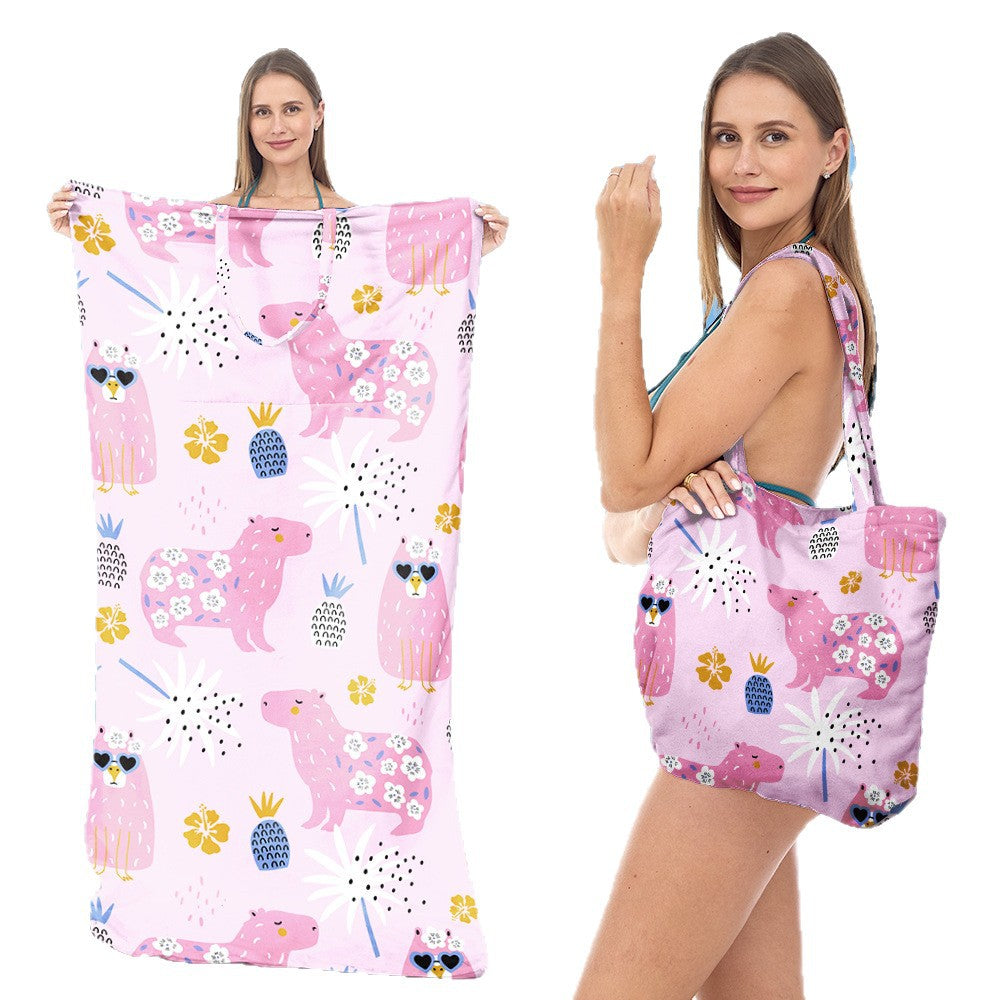 Beach towel with integrated carrying bag Bowlift