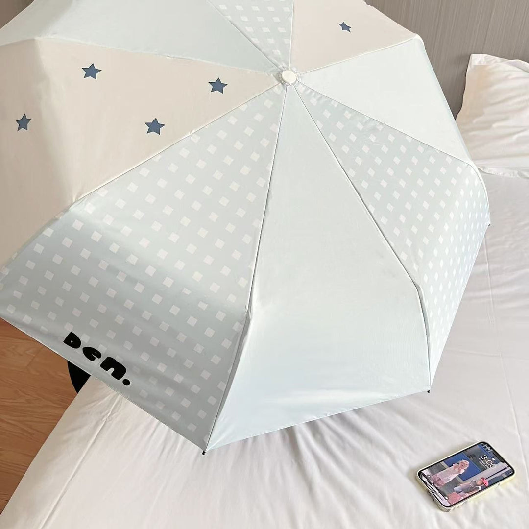 Women's folding umbrella with unique star pattern and practical carrying bag Bowlift