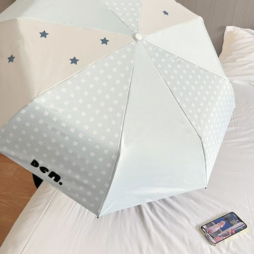 Women's folding umbrella with unique star pattern and practical carrying bag Bowlift