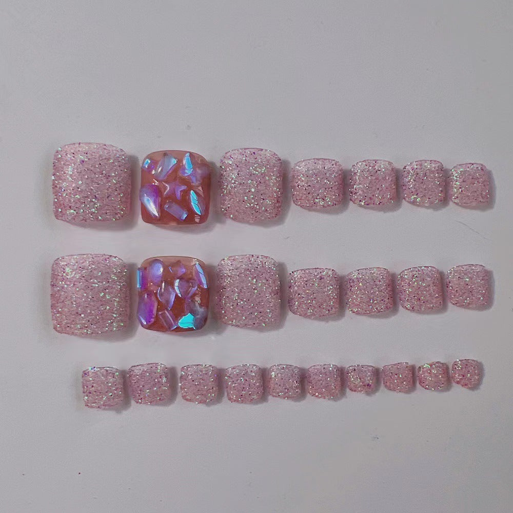 Glamorous artificial nails with sparkling glitter Bowlift