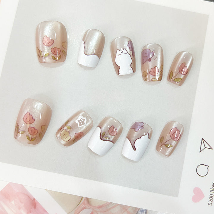 Artistic nail tips with floral motifs Bowlift