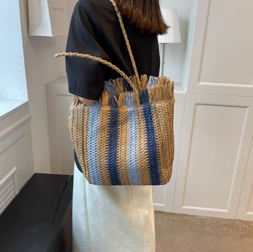 Braided beach bag with fringe details Bowlift