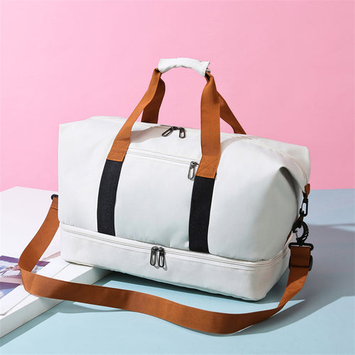 Sporty travel bag with adjustable shoulder strap and organizer compartments Bowlift