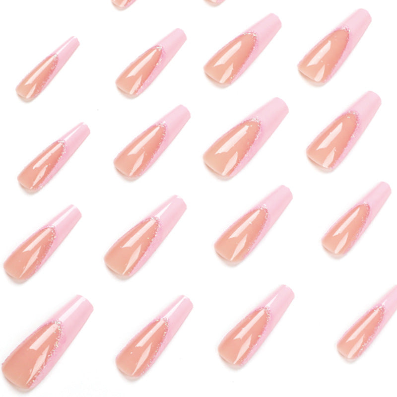Artificial nail extensions with glitter decoration Bowlift