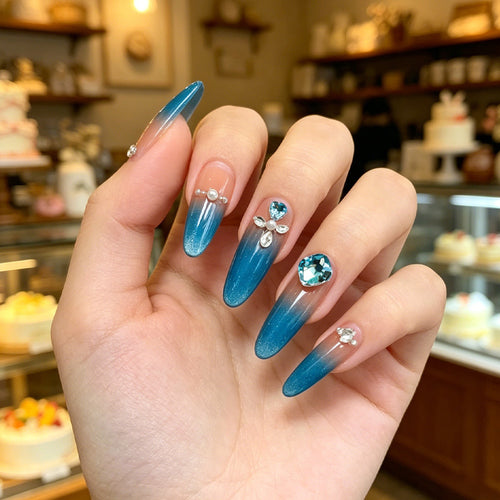 Glamorous artificial nails with rhinestone applications Bowlift