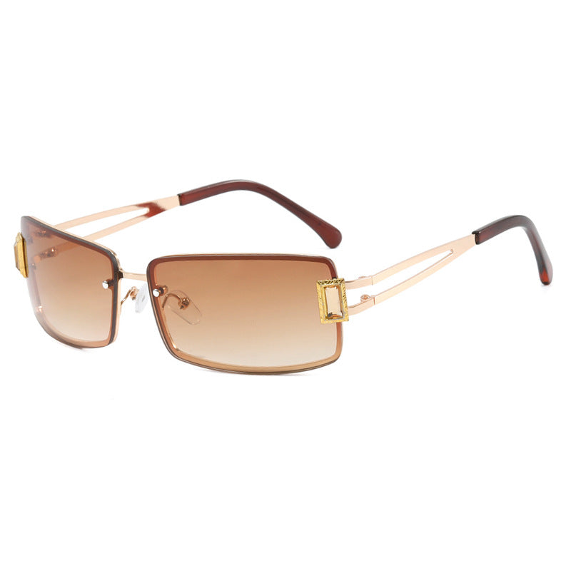 Ladies stylish sunglasses with elegant trapezoidal lenses and filigree metal frame Bowlift