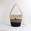 Braided shoulder bag with stylish accent Bowlift