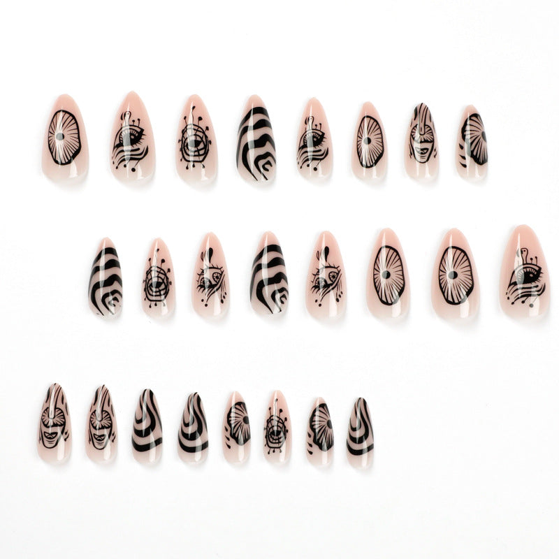 Artistic acrylic nails in elegant stiletto design with graphic patterns Bowlift