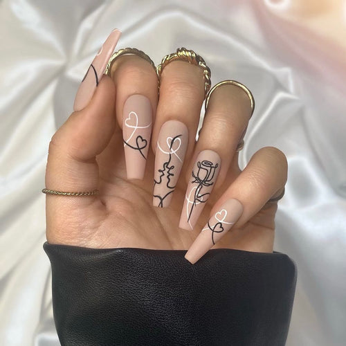 Artful nail extensions with creative line and heart design Bowlift