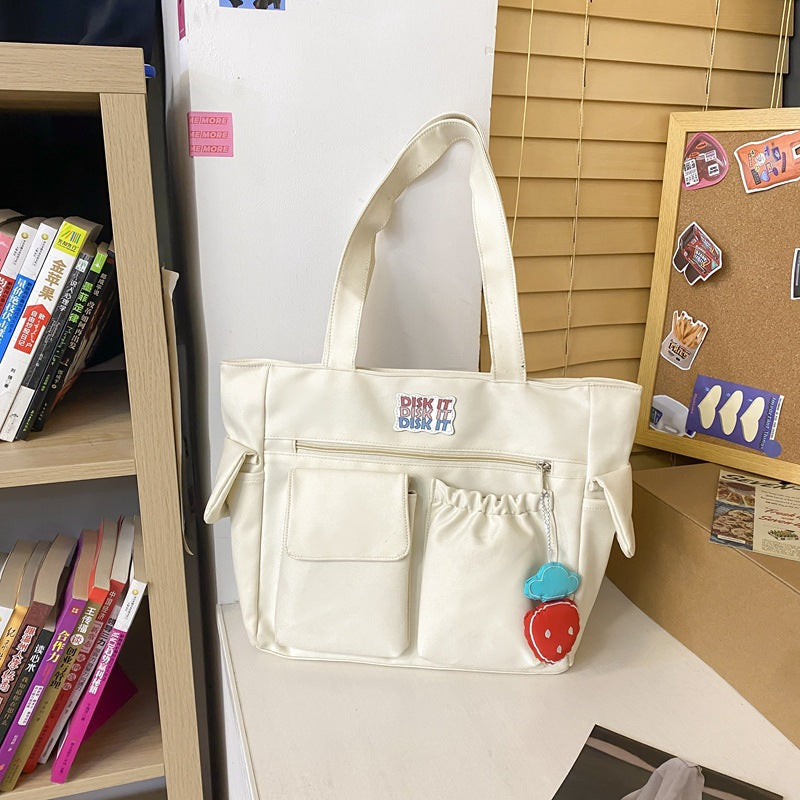 Tote bag with versatile compartments and ergonomic design Bowlift