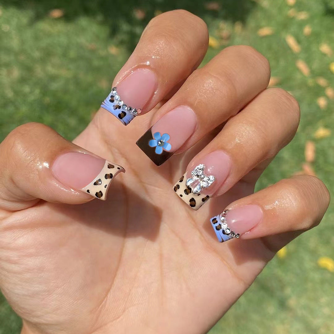 Artificial nails with stylish animal patterns and sparkling accents Bowlift