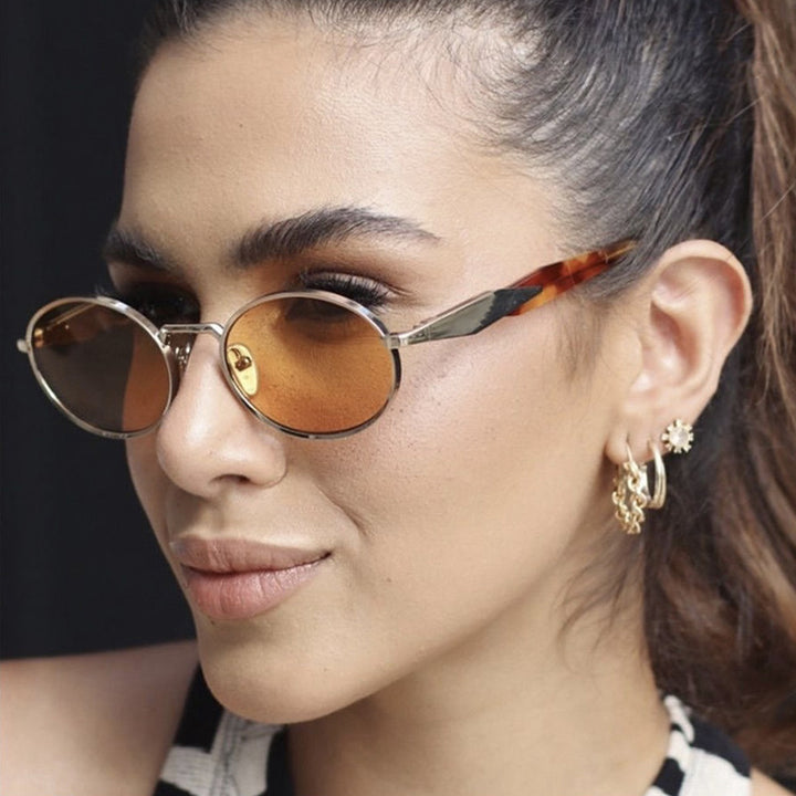 Women's fashionable sunglasses in elegant oval design with trendy accents Bowlift