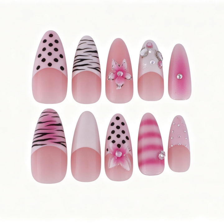 Artistic Press-On Nail Design with Unique Patterns and Rhinestone Accents Bowlift