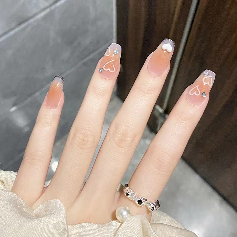 Artful nail tips in heart design Bowlift