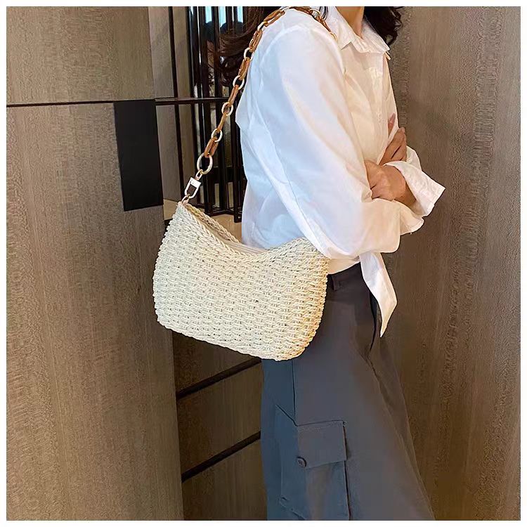 Handbag with chain carry handle Bowlift