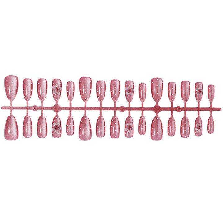 Artificial nail set with glamorous glitter design and floral accent Bowlift