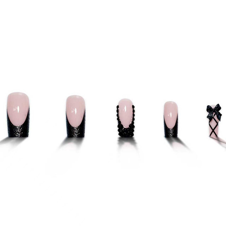 Stiletto Nail Art Extensions with Decorative Accents Bowlift