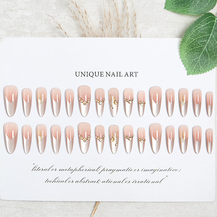 Glamorous art nails with elegant golden details Bowlift