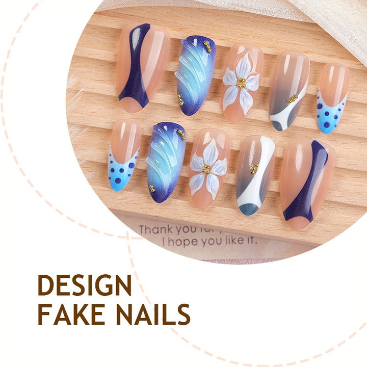 Nail set with handmade floral designs and elegant glitter Bowlift
