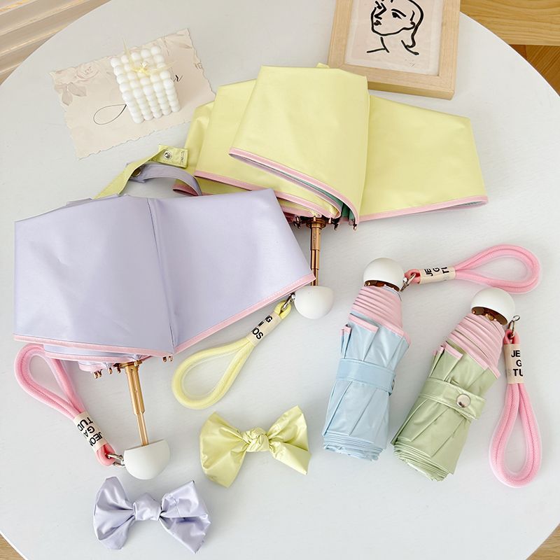 Ladies compact folding umbrella with practical handbag loop Bowlift