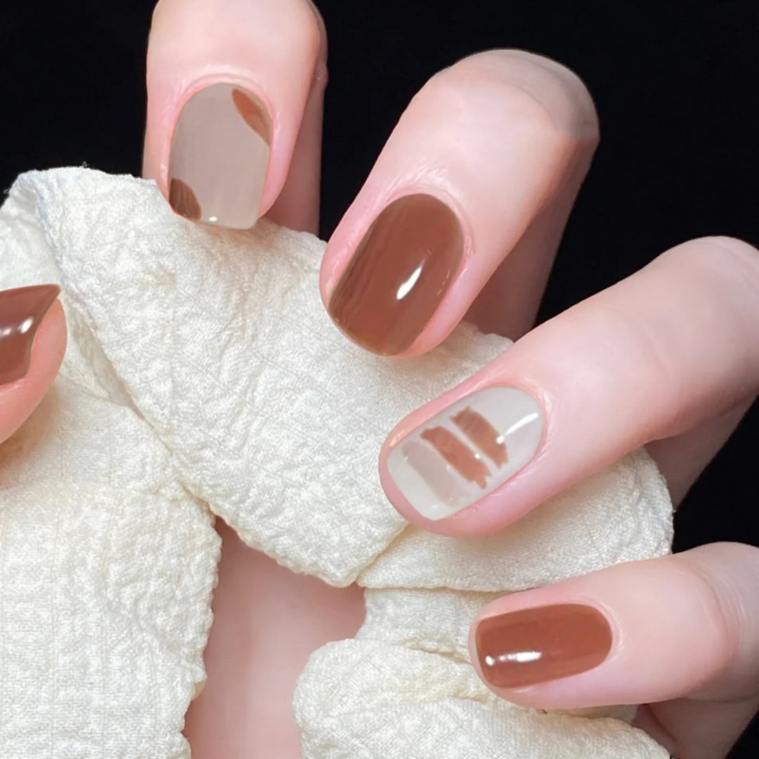 Artful nail extensions with an elegant leaf pattern Bowlift