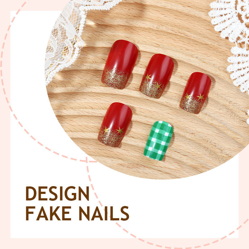 Artificial nail set with festive Christmas design and glamorous accents Bowlift
