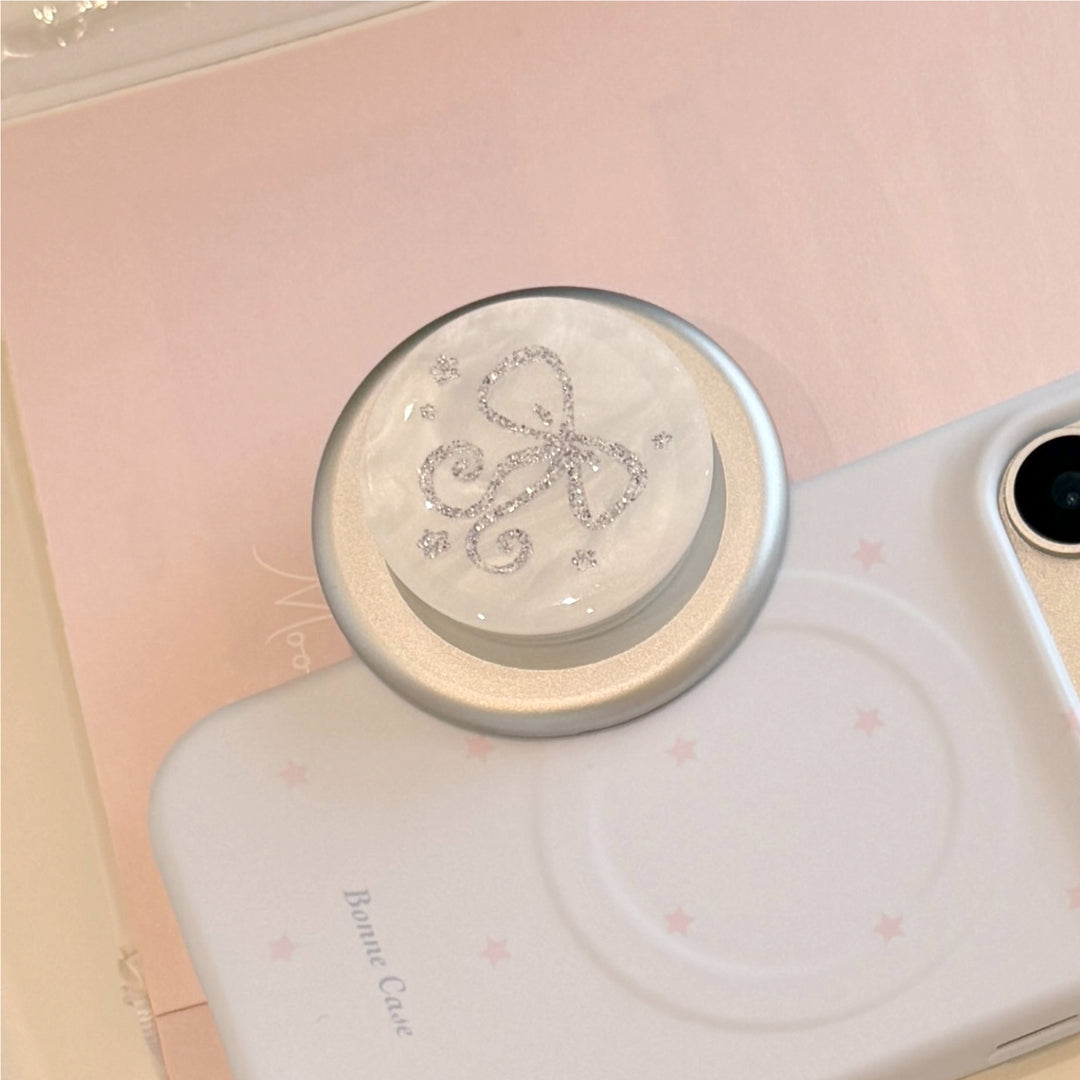 Stylish smartphone finger holder with glitter bow design Bowlift