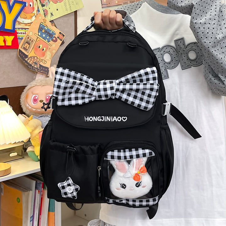 Playful Bow-Embellished Backpack Bowlift