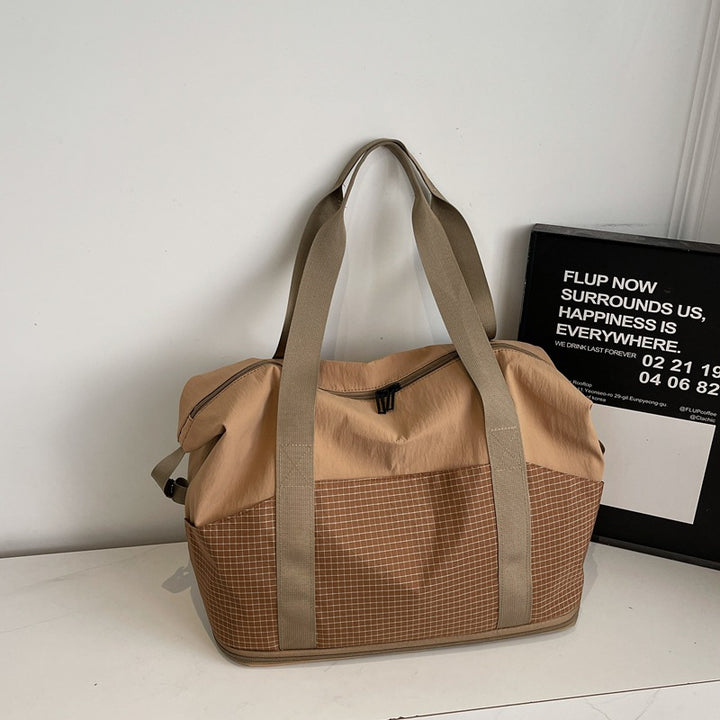Multifunctional sports and travel bag with innovative compartment arrangement Bowlift