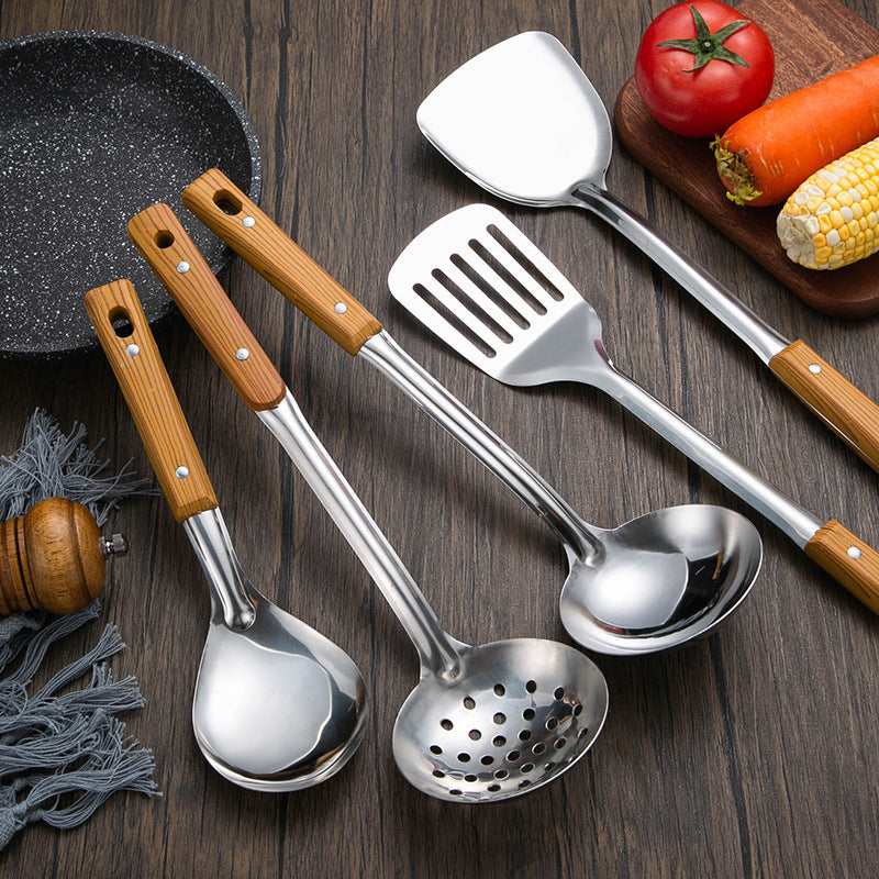 Slotted stainless steel turner spatula with ergonomic wooden handle Bowlift