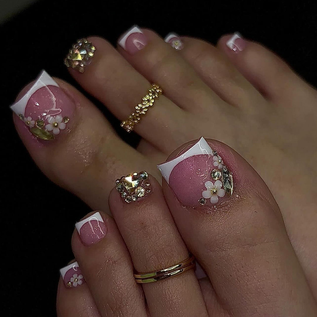 Artful toenail decoration with elegant gold accent Bowlift