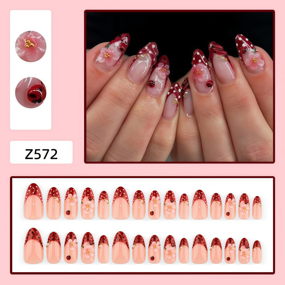 Artificial nails with floral design and 3D accents Bowlift