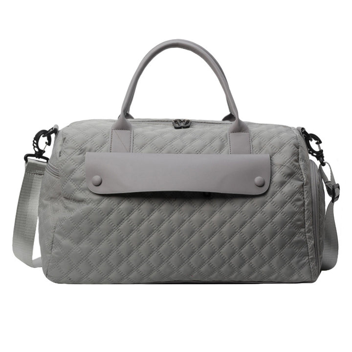 Sporty travel bag with ergonomic carrying system and water-repellent material Bowlift
