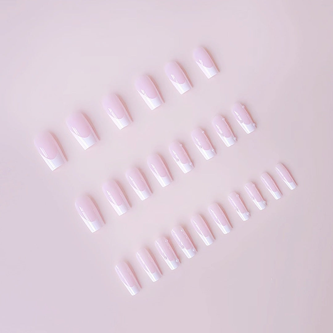 Artificial nail tips with elegant pearl accents Bowlift