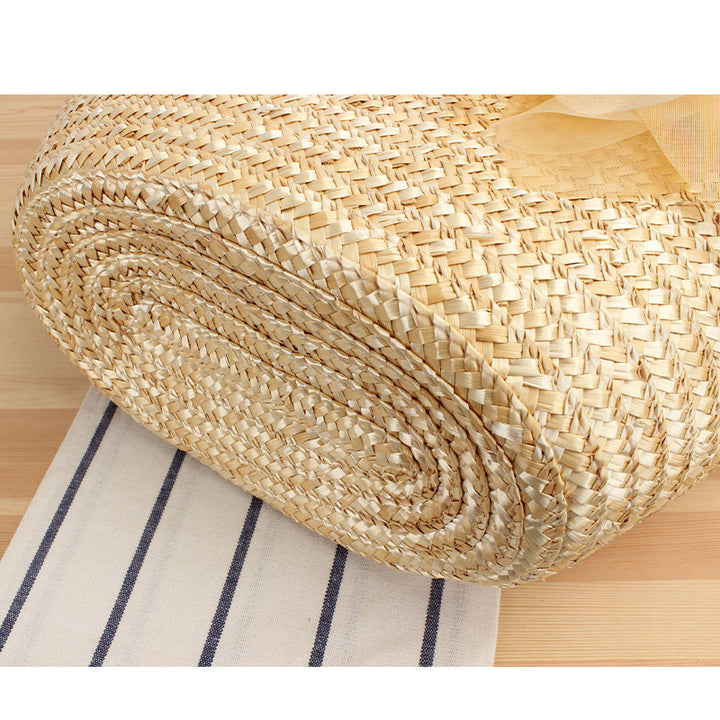 Elegant straw bag with floral accents Bowlift