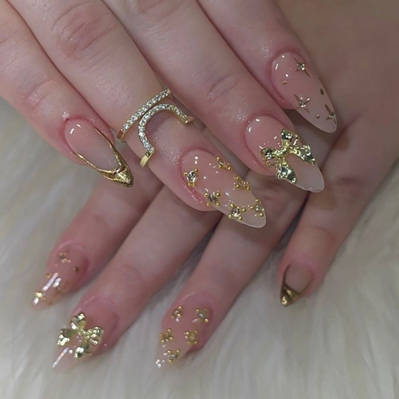 Artful stiletto nails with glitter accents Bowlift
