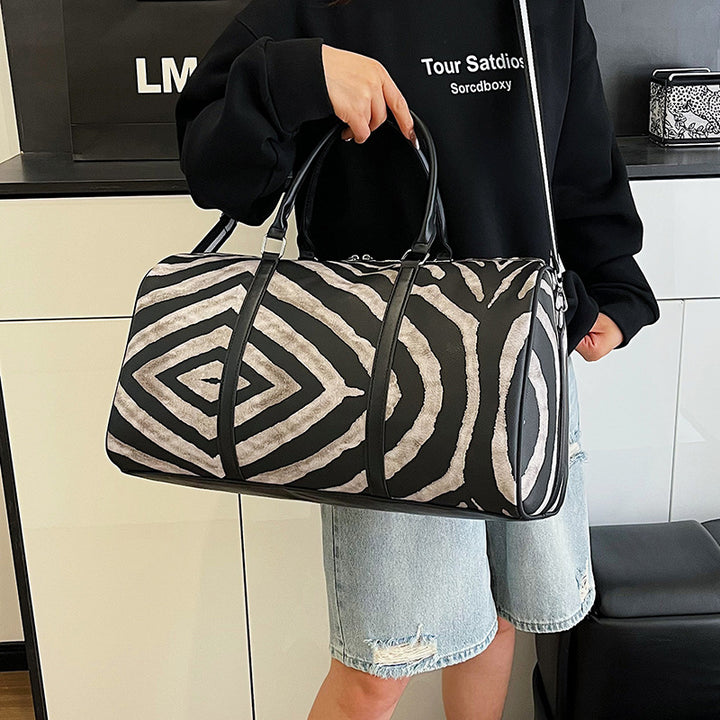 Sporty travel bag in trendy zebra pattern Bowlift