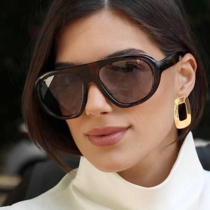 Women striking sunglasses with futuristic frame and sturdy design Bowlift