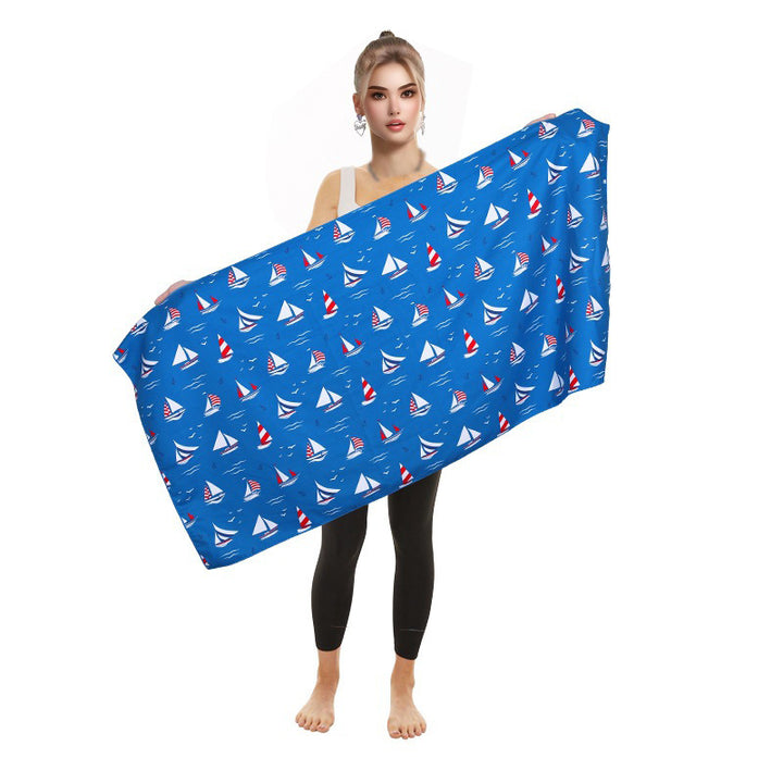 Beach towel with vibrant flamingo motifs and quick-drying material Bowlift