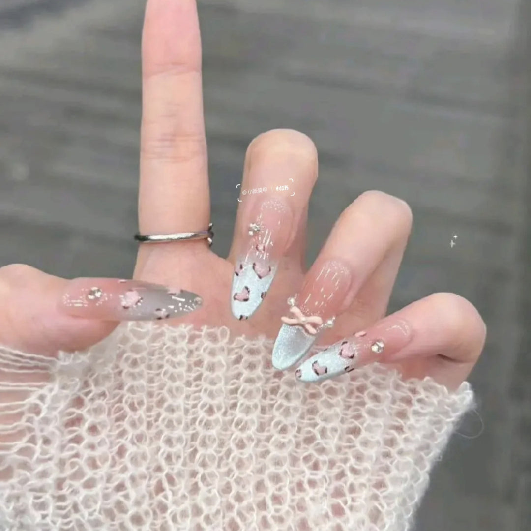 Artistic Press-On Nail Design Set with Floral and Gemstone Accents Bowlift